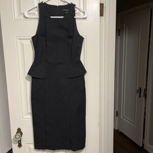 Black pencil dress with peplum